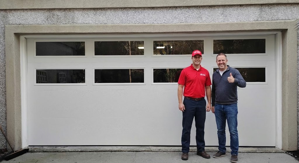 Happy homeowner giving a thumbs up alongside an A1 Garage Door Repair technician after a successful job..jpg in Charleston, SC